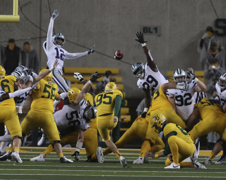 Baylor's John Mayers (95) kicks the go-ahead field goal over Kansas State in the final seconds of an NCAA college football game Saturday, Nov. 28, 2020, in Waco, Texas. (Rod Aydelotte/Waco Tribune Herald via AP)/