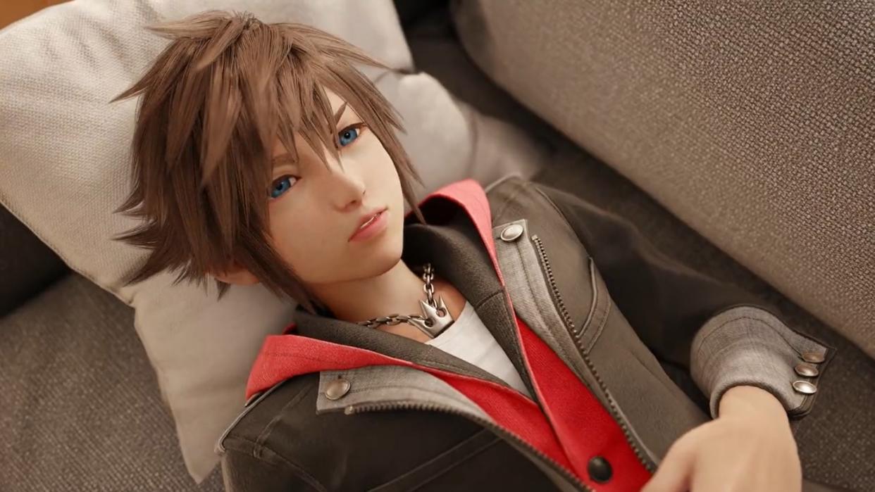  A screenshot from the Kingdom Hearts 4 announcement video showing Sora lying on a grey couch. . 