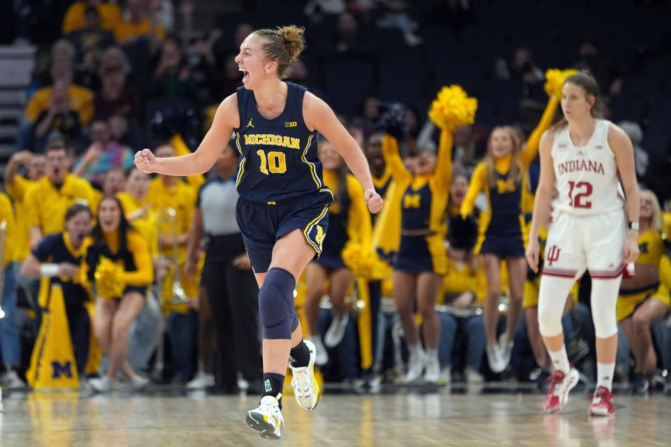 Michigan guard Jordan Hobbs (10) celebrates after making a 3-point basket during the second half of an NCAA college basketball quarterfinal game against Indiana at the Big Ten women's tournament at Target Center in Minneapolis on Friday, March 8, 2024.