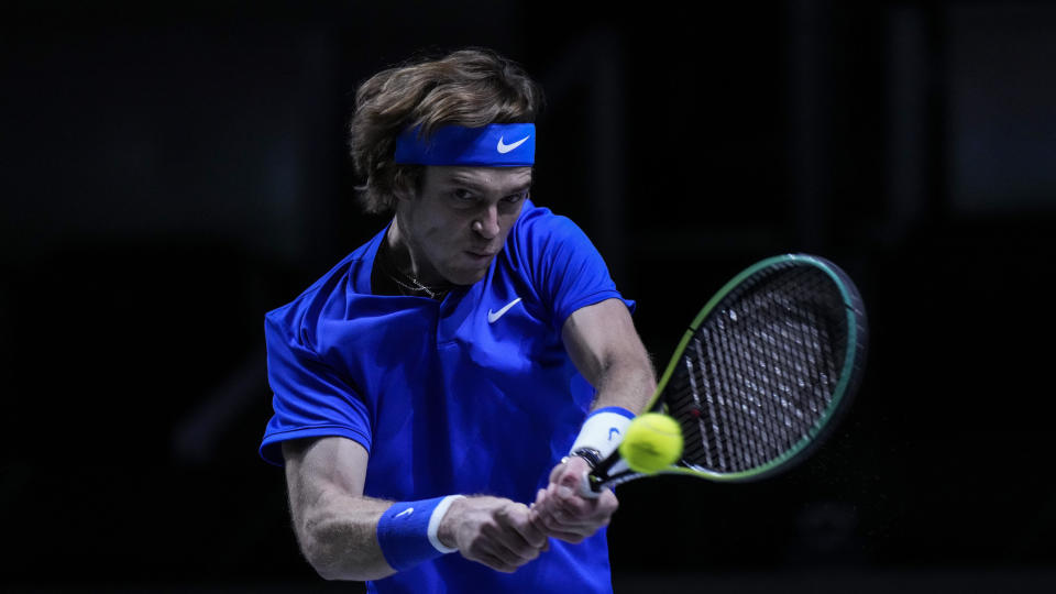 CORRECTS NAME OF PLAYER Russian Tennis Federation's Andrey Rublev returns the ball to Croatia's Borna Gojo during their Davis Cup tennis finals at Madrid Arena in Madrid, Spain, Sunday, Dec. 5, 2021. (AP Photo/Manu Fernandez)