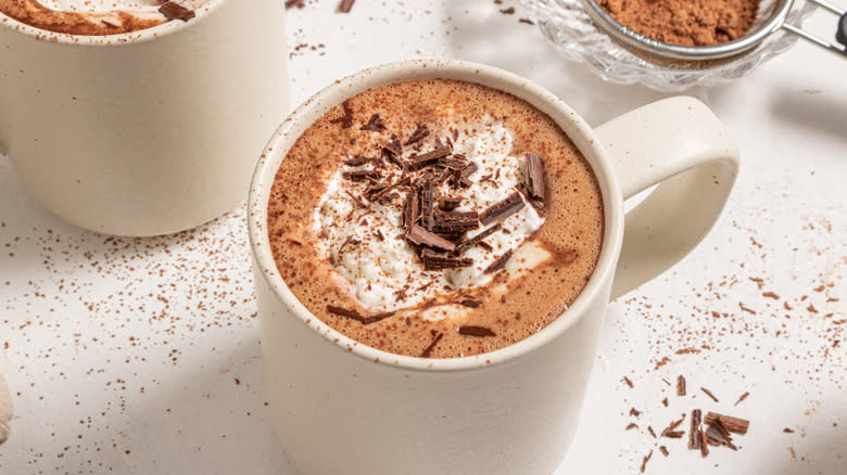 Espresso hot chocolate with whipped cream and shaved chocolate on top