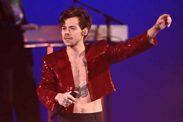 <p> Dave J Hogan/Getty</p> Harry Styles performing at the BRIT Awards in February 2023