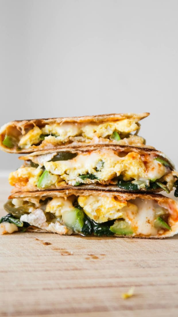 <p>Looking for some new easy and healthy breakfast ideas? You’ll love this healthy breakfast quesadilla recipe filled with eggs, cheese and vegetables. Plus it's delicious and pretty quick to make.</p><p><strong>Get the recipe: <a href="https://www.homemademastery.com/healthy-breakfast-quesadilla-recipe/" rel="nofollow noopener" target="_blank" data-ylk="slk:Healthy Vegetarian Breakfast Quesadilla;elm:context_link;itc:0;sec:content-canvas" class="link "><em>Healthy Vegetarian Breakfast Quesadilla</em></a></strong></p><p>Homemade Mastery</p>