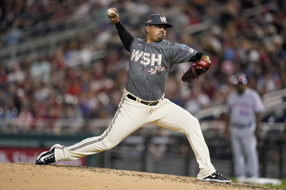 Washington Nationals relief pitcher Andres Machado throws during the fifth inning of a baseball game against the New York Mets at Nationals Park, Friday, May 12, 2023, in Washington. (AP Photo/Alex Brandon)