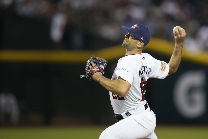 United States pitcher Nick Martinez throws against Mexico during the first inning.