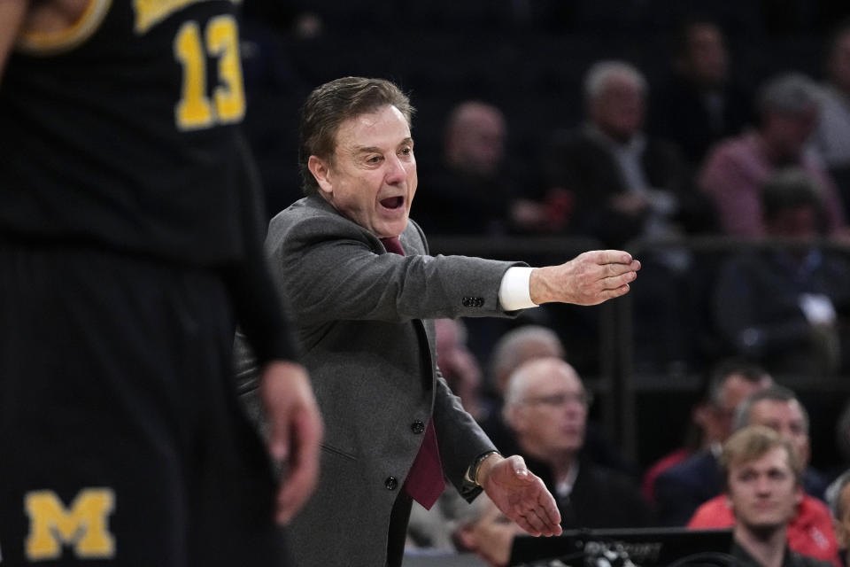 St. John's head coach Rick Pitino calls out to his team during the second half of an NCAA college basetball game against Michigan, Monday, Nov. 13, 2023, in New York. (AP Photo/Frank Franklin II)