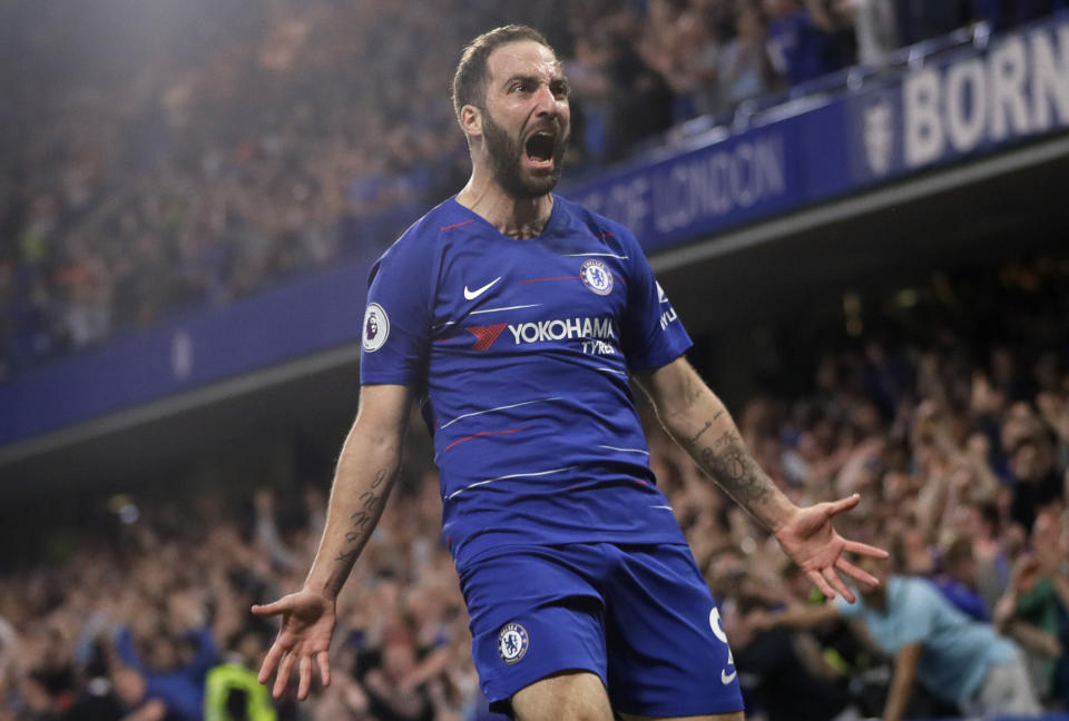 Chelsea's Gonzalo Higuain celebrates scoring his side's second goal during the English Premier League soccer match between Chelsea and Burnley at Stamford Bridge stadium in London, Monday, April 22, 2019. (AP Photo/Kirsty Wigglesworth)