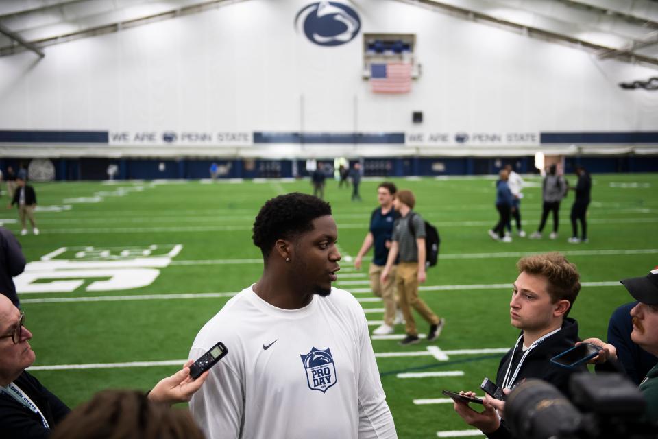 Defensive end Adisa Isaac talks with reporters during Penn State's Pro Day in Holuba Hall on March 15, 2024, in State College.