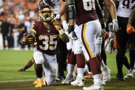 Washington Football Team running back Jaret Patterson (35) celebrates his touchdown during the second half of a preseason NFL football game against the Cincinnati Bengals, Friday, Aug. 20, 2021, in Landover, Md. (AP Photo/Nick Wass)