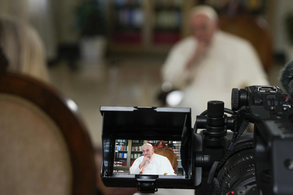 Pope Francis ponders a question during an interview with The Associated Press at The Vatican, Tuesday, Jan. 24, 2023. Pope Francis said he hasn't even considered issuing norms to regulate future papal resignations and says he plans to continue on for as long as he can as bishop of Rome, despite a wave of attacks against him by some top-ranked cardinals and bishops. (AP Photo/Andrew Medichini)