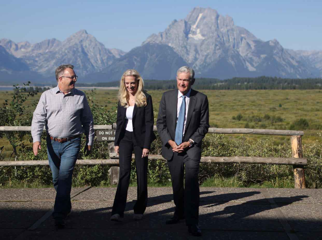 FTSE 100 John C. Williams, president and chief executive officer of the Federal Reserve Bank of New York, Lael Brainard, vice chair of the Board of Governors of the Federal Reserve, and Jerome Powell, chair of the Federal Reserve, walk in Teton National Park where financial leaders from around the world gathered for the Jackson Hole Economic Symposium outside Jackson, Wyoming, U.S., August 26, 2022. REUTERS/Jim Urquhart