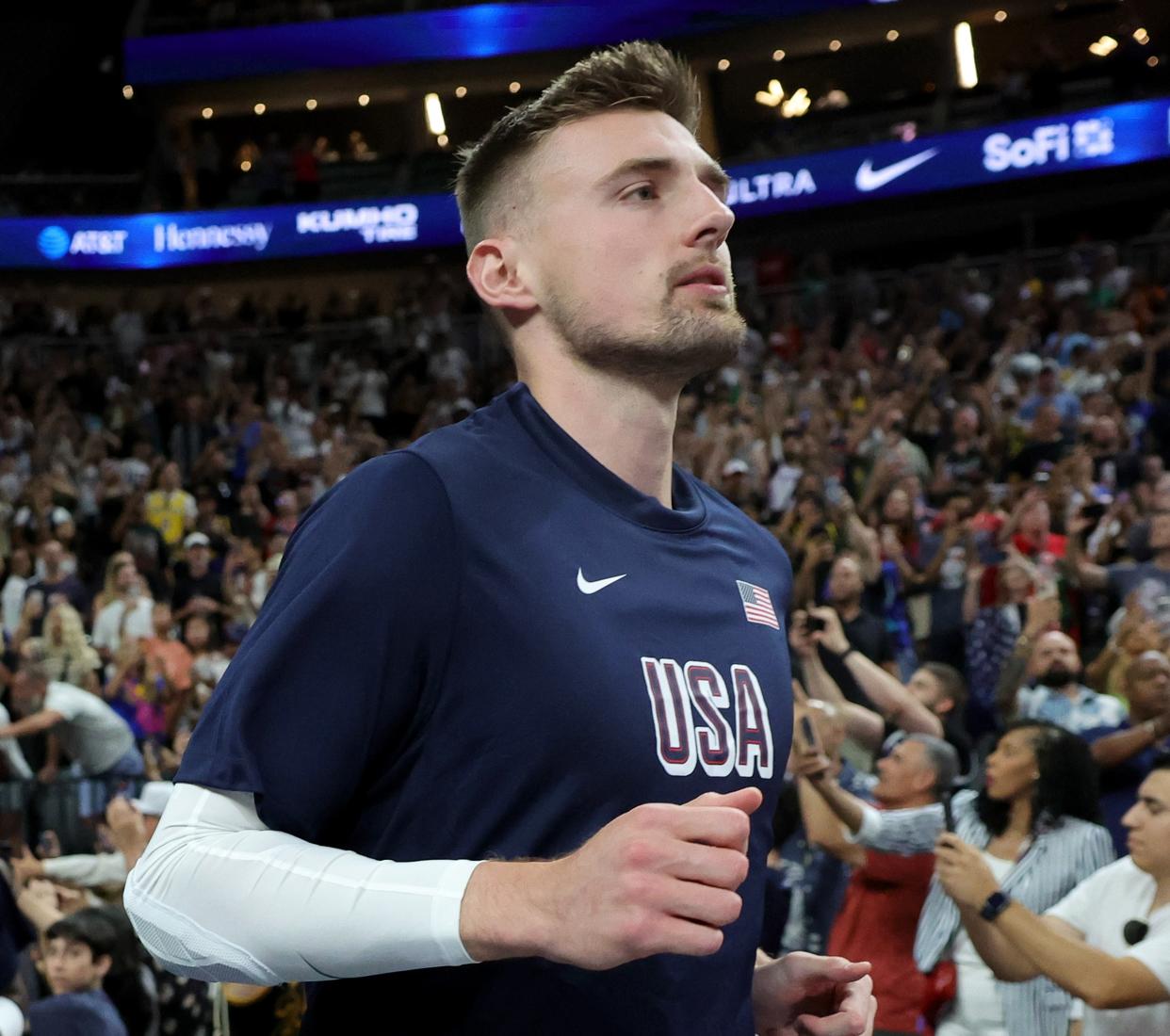 Micah Potter of the 2024 USA Basketball Men's Select Team runs onto the court for the U.S. exhibition game against Canada ahead of the Paris Olympics at T-Mobile Arena on July 10, 2024, in Las Vegas. (Photo by Ethan Miller/Getty Images)