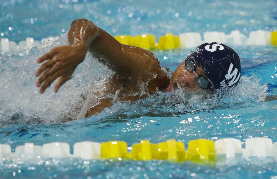 Wilmington Friends' Ty Wilmore swims to a win in the 200 yard freestyle during the DIAA boys swimming state championships in the Rawstrom Natatorium at the University of Delaware, Saturday, Feb. 25, 2023.