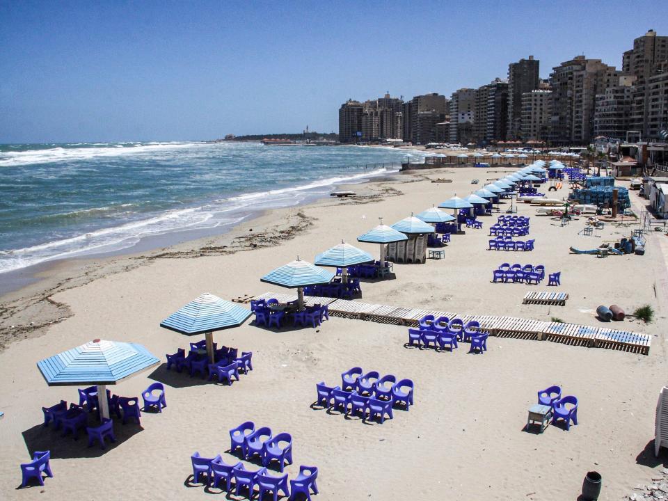 This picture taken on May 24, 2020 on the first day of Eid al-Fitr, the Muslim holiday which starts at the conclusion of the holy fasting month of Ramadan, shows a view of a deserted beach in Egypt's northern Mediterranean coastal city of Alexandria, empty due to the COVID-19 coronavirus pandemic. - Egypt had previously announced a lengthening of its night-time curfew and other measures to prevent large gatherings during the Eid al-Fitr holidays. One of the most important dates in the Muslim calendar, it is traditionally celebrated with mosque prayers, family feasts and shopping for new clothes, gifts and sweet treats. (Photo by - / AFP) (Photo by -/AFP via Getty Images)