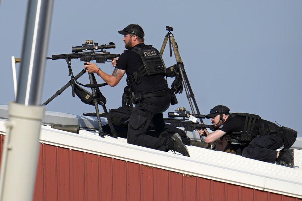 Police snipers returned fire after shots were fired while Donald Trump was speaking at the rally.  (Gene J. Puskar/AP)