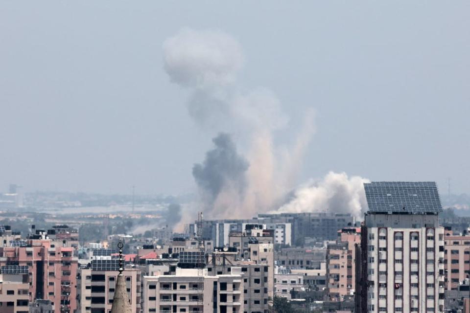 <div class="inline-image__caption"><p>Smoke rises following an Israeli strike in Gaza on May 10, 2023.</p></div> <div class="inline-image__credit">Ahmed Zakot/Reuters</div>