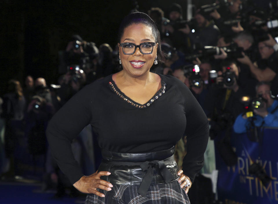 FILE - In this March 13, 2018, file photo, actress Oprah Winfrey poses for photographers upon arrival at the premiere of the film "A Wrinkle In Time" in London. Winfrey announced Wednesday, May 20, 2020 that her Oprah Winfrey Charitable Foundation will donate money to organizations dedicated to helping undeserved communities in Chicago; Nashville, Tennessee; Milwaukee, Wisconsin; and Kosciusko, Mississippi, where she was born. (Photo by Joel C Ryan/Invision/AP, File)