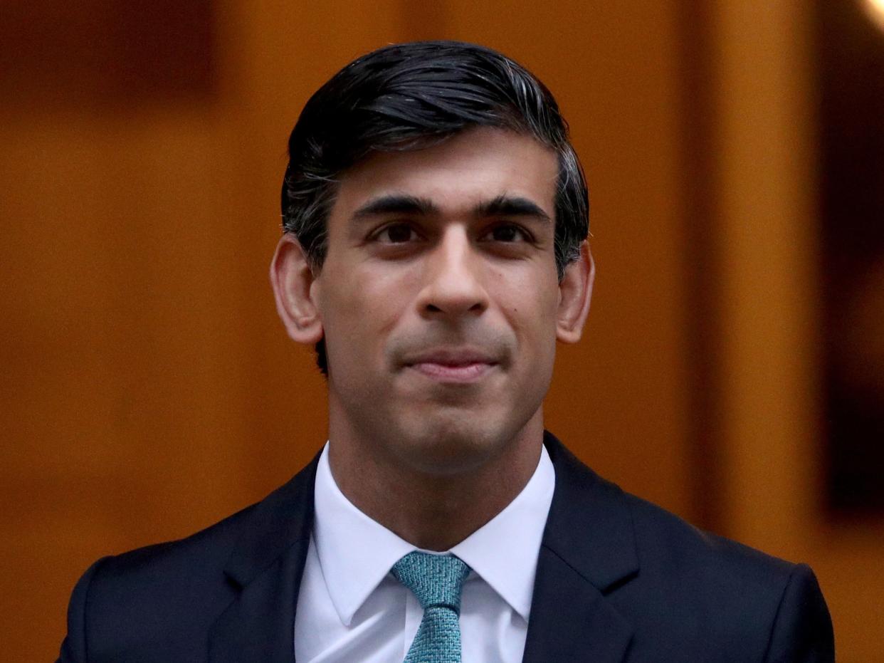 Rishi Sunak made a vast majority of house buyers exempt from paying the tax until the end of March (Yui Mok/PA)