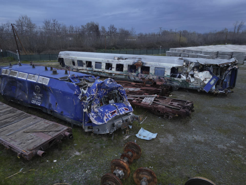 An aerial view of the wagons and other parts recovered from a train wreck, near Larissa city, central Greece, Wednesday, Feb. 28, 2024. Greece's deadliest rail disaster killed 57 people when a passenger train slammed into an oncoming cargo train. The tragedy shocked the country, with many of the victims being university students. (AP Photo)