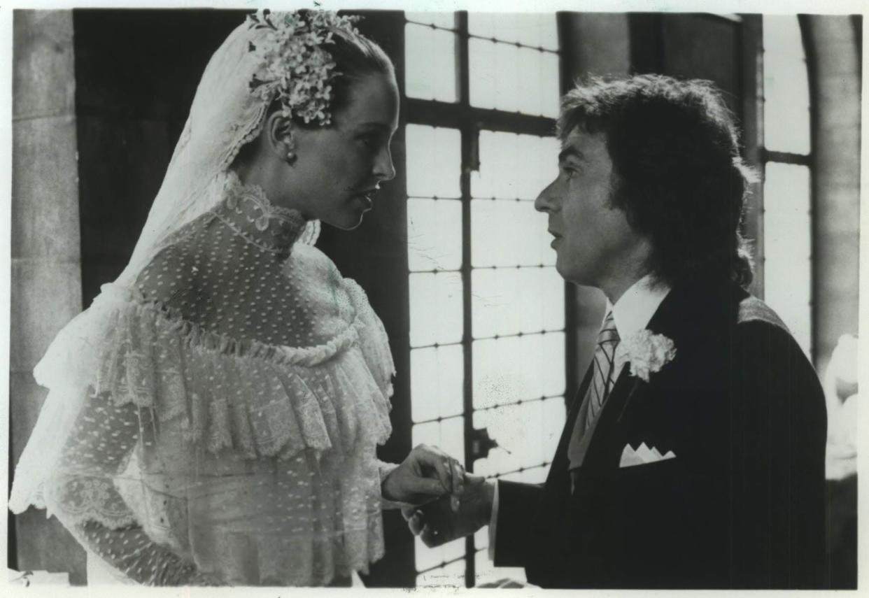 Actor Dudley Moore, with Jill Eikenberry, in the title role of the movie comedy "Arthur."