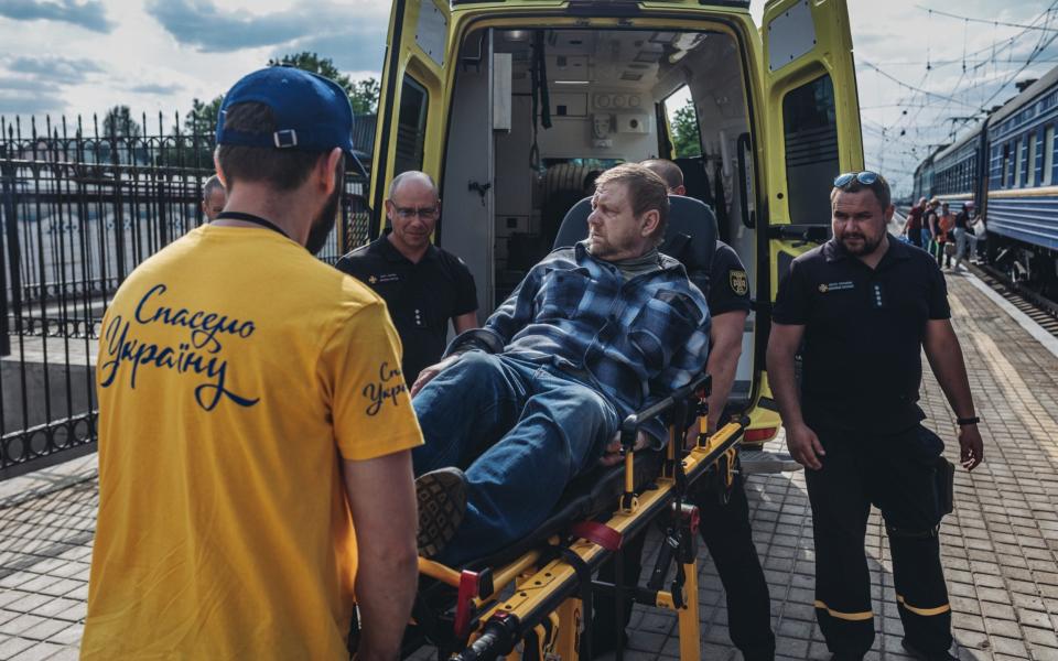 POKROVSK, DONETSK OBLAST, UKRAINE - MAY 30: A person with reduced mobility is evacuated from Donbas at the train station in Pokrovsk, Donetsk Oblast, Ukraine, on May 30, 2022. (Photo by Diego Herrera Carcedo/Anadolu Agency via Getty Images)  -  Diego Herrera Carcedo/Anadolu Agency via Getty Images