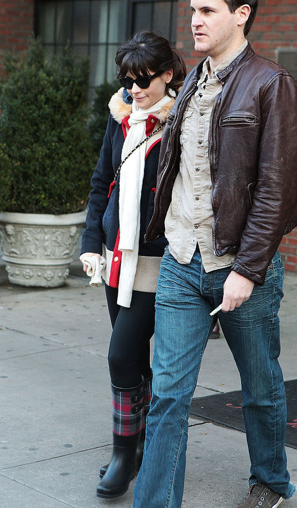 the two holding hands down the street