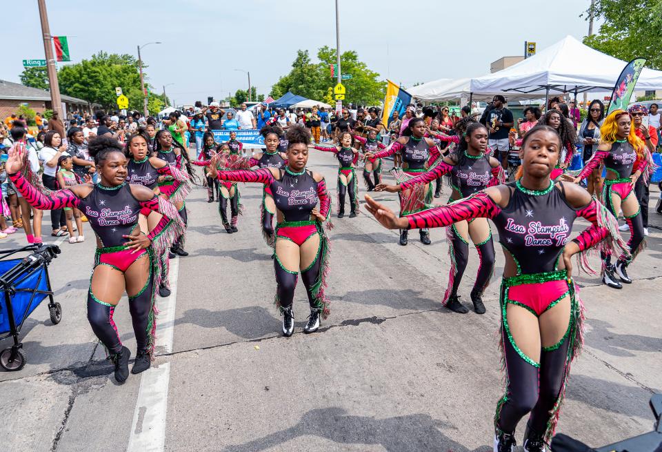 Issa Stampede Dance Team performs in the 52nd Juneteenth Jubilee Parade on June 19, 2023, in Milwaukee.