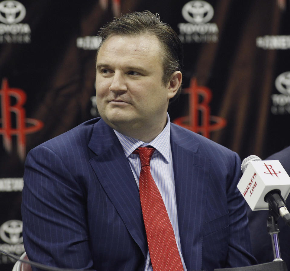 HOUSTON, TX - JULY 13: Houston Rockets general manager Daryl Morey listens as Dwight Howard is officially introduced as a Houston Rocket during a press conference on July 13, 2013 in Houston, Texas.  (Photo by Bob Levey/Getty Images)