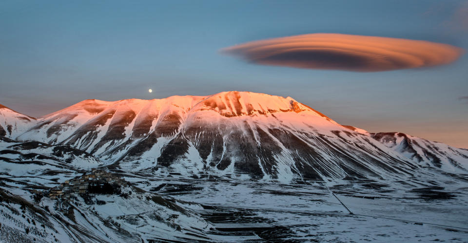 Lenticular cloud over Castelluccio di Norcia, Umbria, Italy.