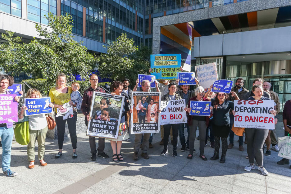 Protestors holding placards outside Federal Court in Melbourne in 2019. Source: Getty