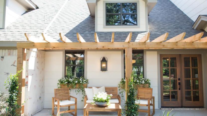 The new pergola covered porch. Note the German Schmear on the bricks