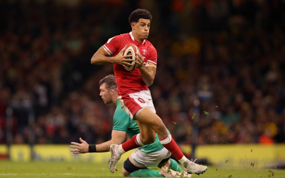 Wales' Rio Dyer gets past Ireland's Peter O'Mahony during the Guinness Six Nations match at the Principality Stadium, Cardiff - Scotland v Wales, Six Nations 2023: What time is kick-off and what TV channel is it on? - Nigel French/PA