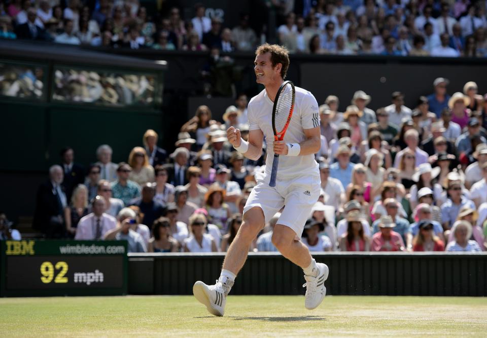 Andy Murray plays against Novak Djokovic on Centre Court during men's singles final at Wimbledon in 2013.