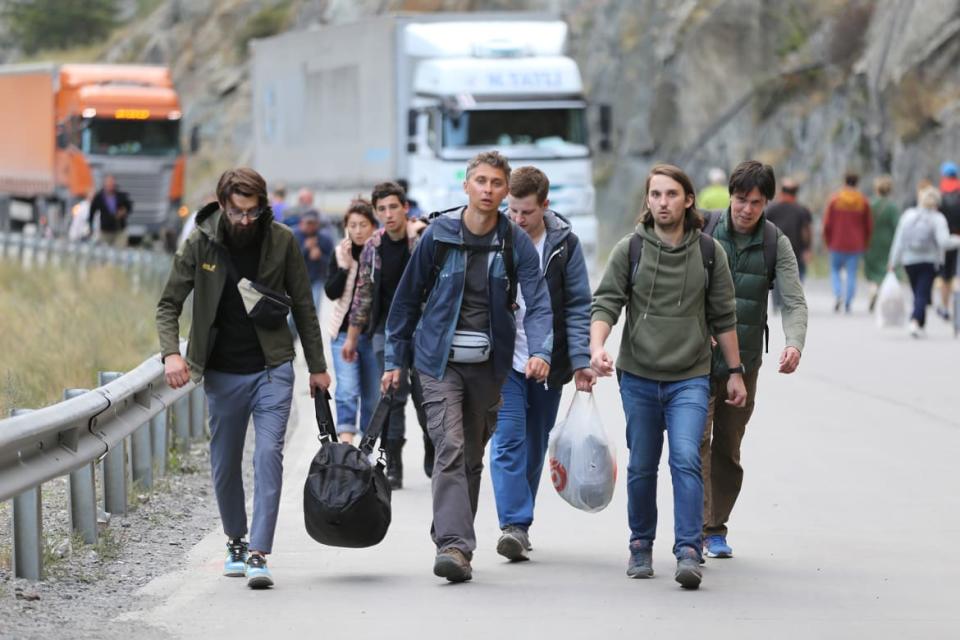<div class="inline-image__caption"><p>Russians are seen attempting to leave their country to avoid a military call-up for the Russia-Ukraine war as queues have formed at the Kazbegi border crossing in the Kazbegi municipality of Stepantsminda, Georgia, on Sept. 28, 2022.</p></div> <div class="inline-image__credit">Davit Kachkachishvili/Anadolu Agency via Getty</div>