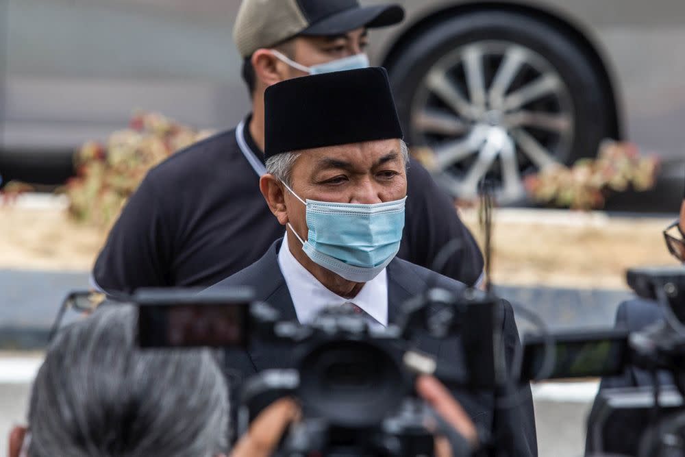 File picture shows Umno president Datuk Seri Ahmad Zahid Hamidi speaking to members of the press outside Istana Negara in Kuala Lumpur June 11, 2021. — Picture by Firdaus Latif