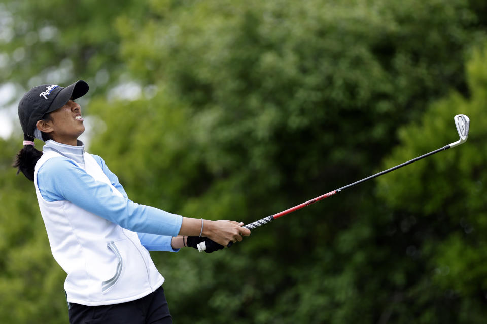 Aditi Ashok, of India, watches her second hole tee shot during the final round of the Mizuho Americas Open golf tournament, Sunday, June 4, 2023, in Jersey City, N.J. (AP Photo/Adam Hunger)