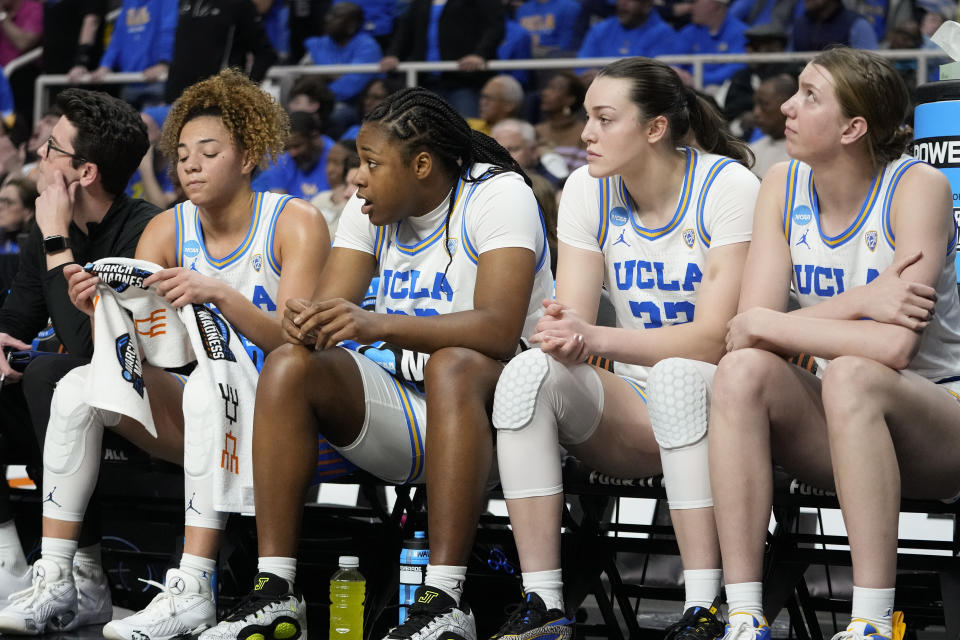 UCLA players react on the bench during the fourth quarter of a Sweet Sixteen round college basketball game against LSU during the NCAA Tournament, Saturday, March 30, 2024, in Albany, N.Y. (AP Photo/Mary Altaffer)