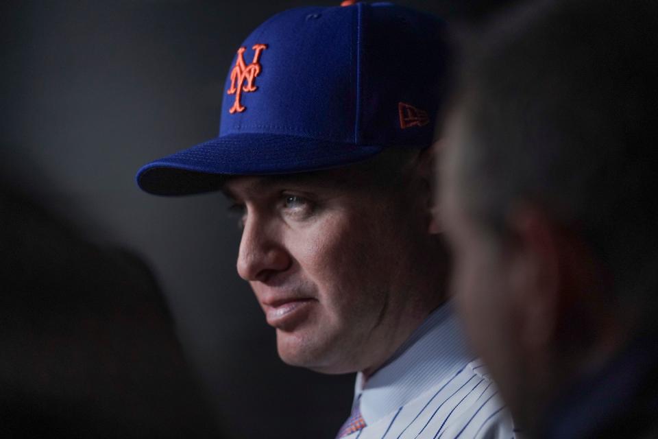Carlos Mendoza listens during interviews after his introduction as the new manager of the New York Mets baseball team, Tuesday, Nov. 14, 2023, at Citifield in New York.