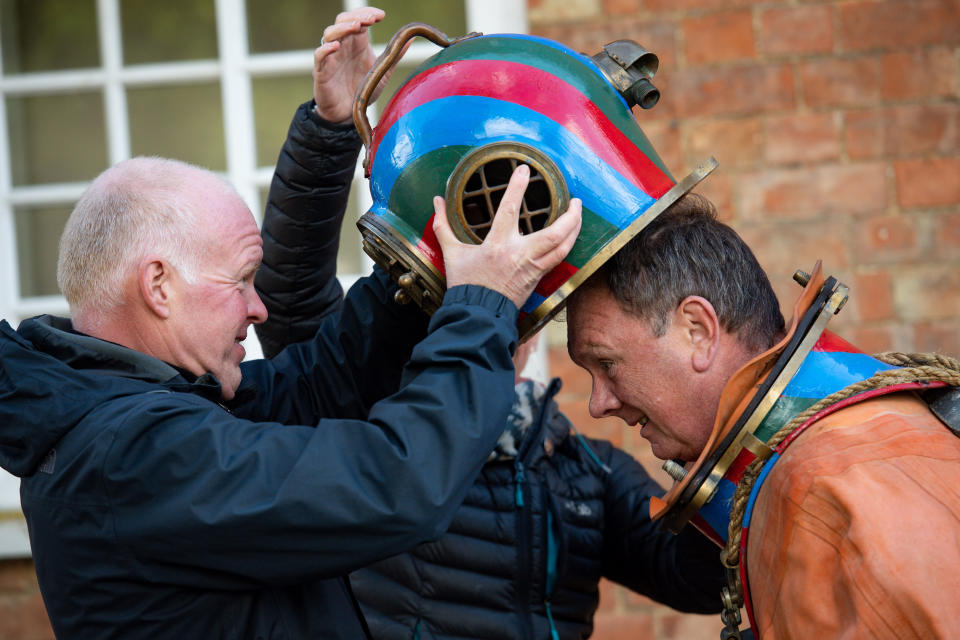 Lloyd Scott at the launch event for Scott's Three Peaks Challenge at Captain Sir Tom Moore's home in Marston Moretaine, Bedfordshire. The veteran fundraiser will attempt to climb the Three Peaks whilst wearing a deep sea diving suit.