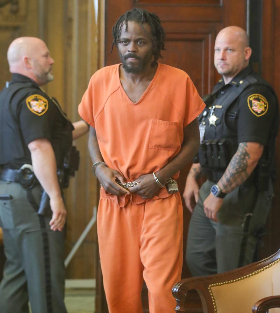 Christopher Mason enters Summit County Common Pleas Court on Monday for a bench trial in the shooting death of his girlfriend, Allison Dinkins.