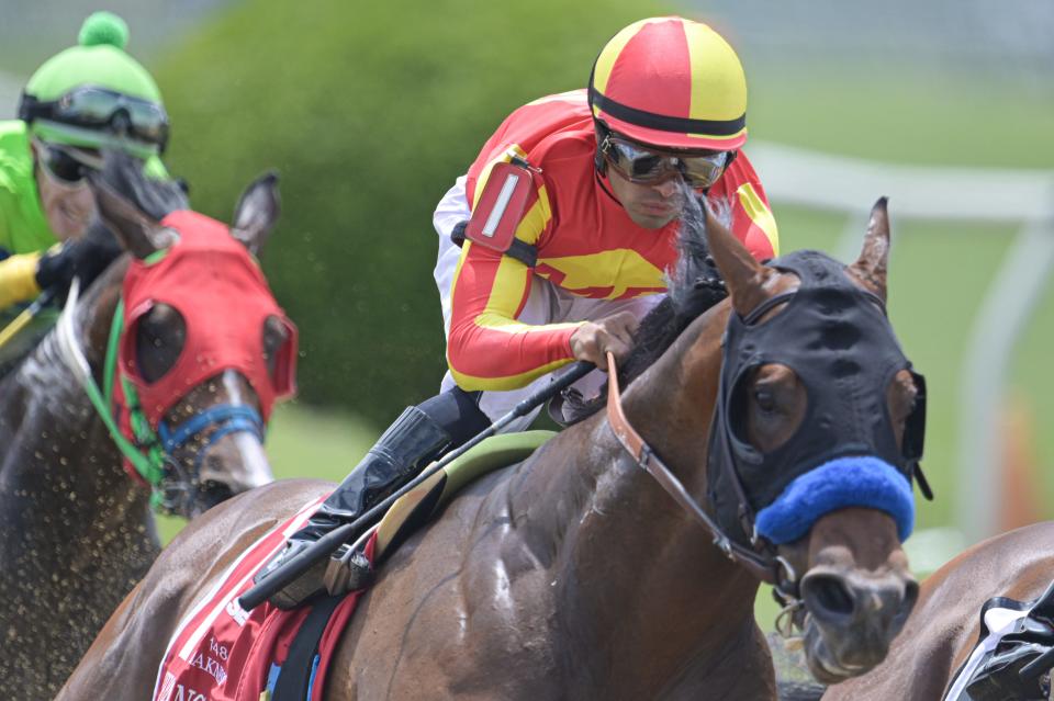 Luis Saez aboard Havnameltdown enters the third turn during the Chick Lang Stakes. The horse had to be euthanized because of an injury and Saez was taken to the hospital.