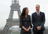 Britain's Prince William and his wife Kate were making their first official visit to Paris, where his mother Diana died in a car crash 20 years ago