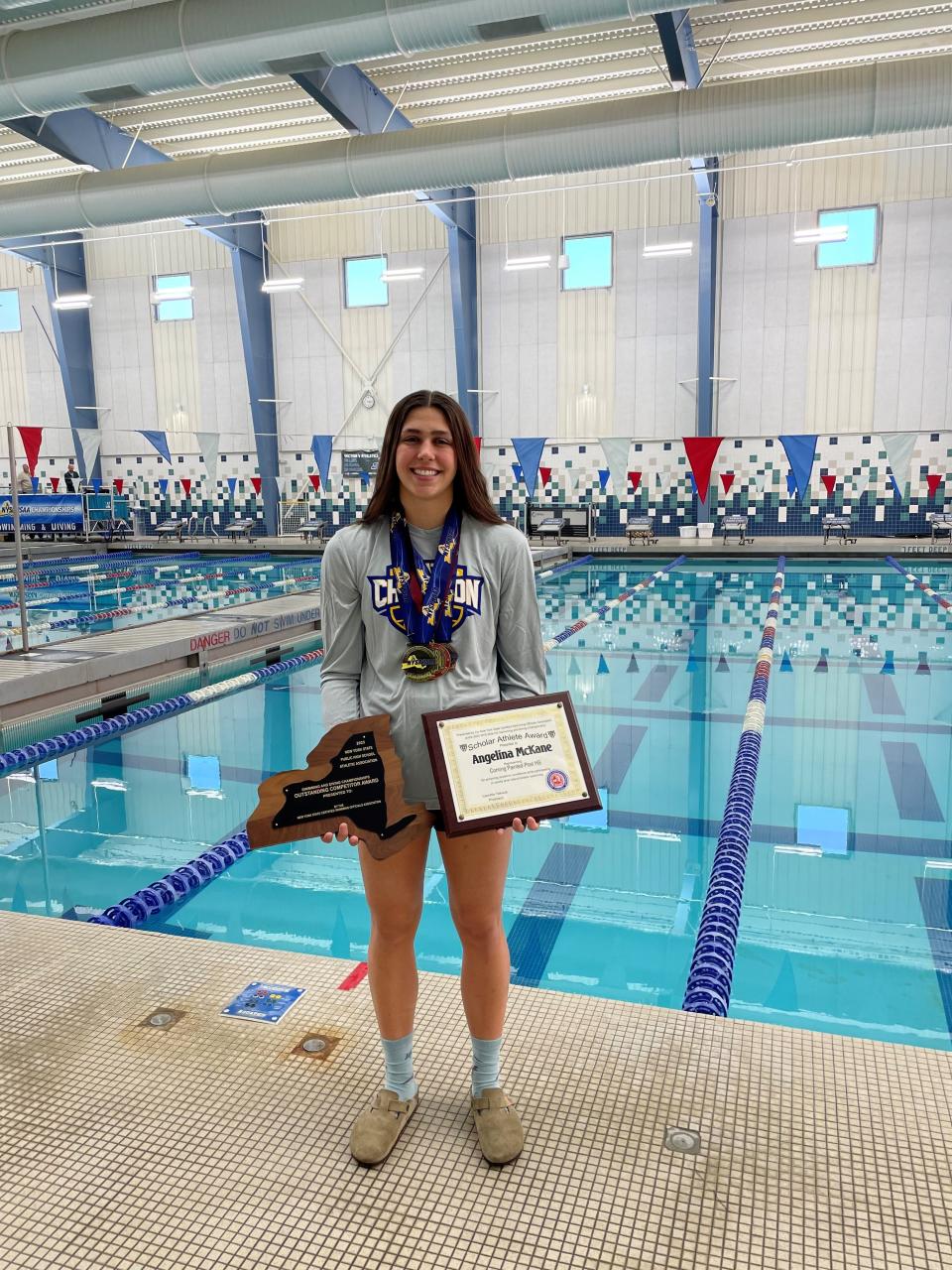 Corning's Angie McKane won the Outstanding Competitor Award and Scholar Athlete Award at the New York State Girls Swimming and Diving Championships on Nov. 18, 2023 at the Webster Aquatic Center.