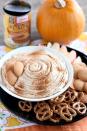 <p>You'll want to dip <em>everything</em> in this no-bake mixture of pumpkin and cheesecake.</p><p><strong>Get the recipe at <a href="http://www.ohsweetbasil.com/pumpkin-cheesecake-dip-recipe.html" rel="nofollow noopener" target="_blank" data-ylk="slk:Oh Sweet Basil;elm:context_link;itc:0;sec:content-canvas" class="link ">Oh Sweet Basil</a>.</strong> </p>