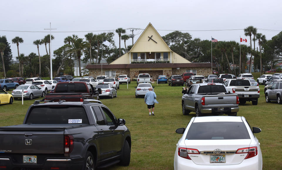 People in cars attend services at a Daytona Beach church on Easter Sunday. (Photo: Photo by Paul Hennessy/SOPA Images/LightRocket via Getty Images)