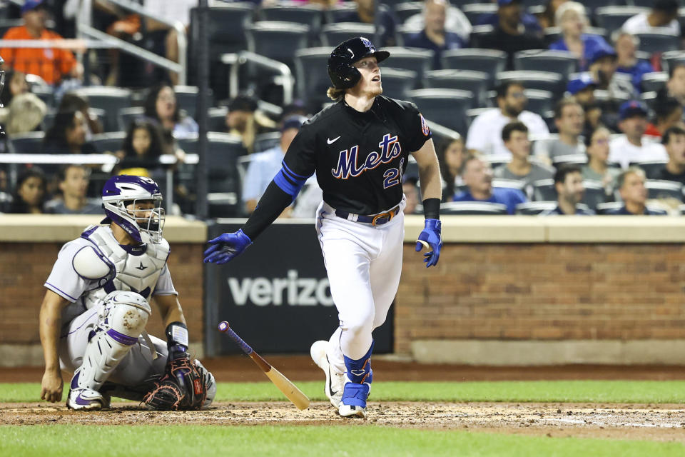 New York Mets' Brett Baty (22) drops the bat after hitting a home run against the Colorado Rockies during the third inning of a baseball game on Friday, Aug. 26, 2022, in New York. (AP Photo/Jessie Alcheh)