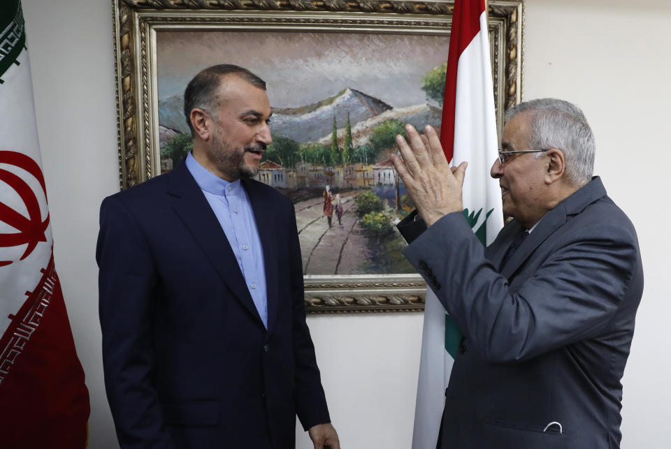 Lebanese Foreign Minister Abdullah Bou Habib, right gestures as he speaks with Iranian counterpart Hossein Amirabdollahian, in Beirut, Lebanon, Thursday, Oct. 7, 2021. Amirabdollahian is in Beirut to meet with Lebanese officials. (AP Photo/Hussein Malla)