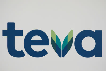 FILE PHOTO: The logo of Teva Pharmaceutical Industries during a news conference held by its CEO, Kare Schultz, to discuss the company's 2019 outlook in Tel Aviv, Israel February 19, 2019. REUTERS/Amir Cohen