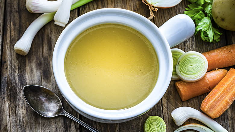 broth and vegetables in bowl