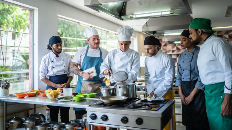 Culinary students attending cooking school